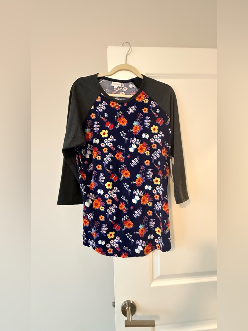 LuLaRoe Navy Floral Contrast Sleeve Top